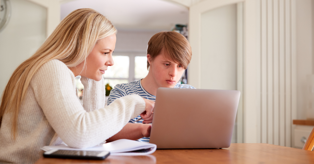 A mother doing homework with her child.