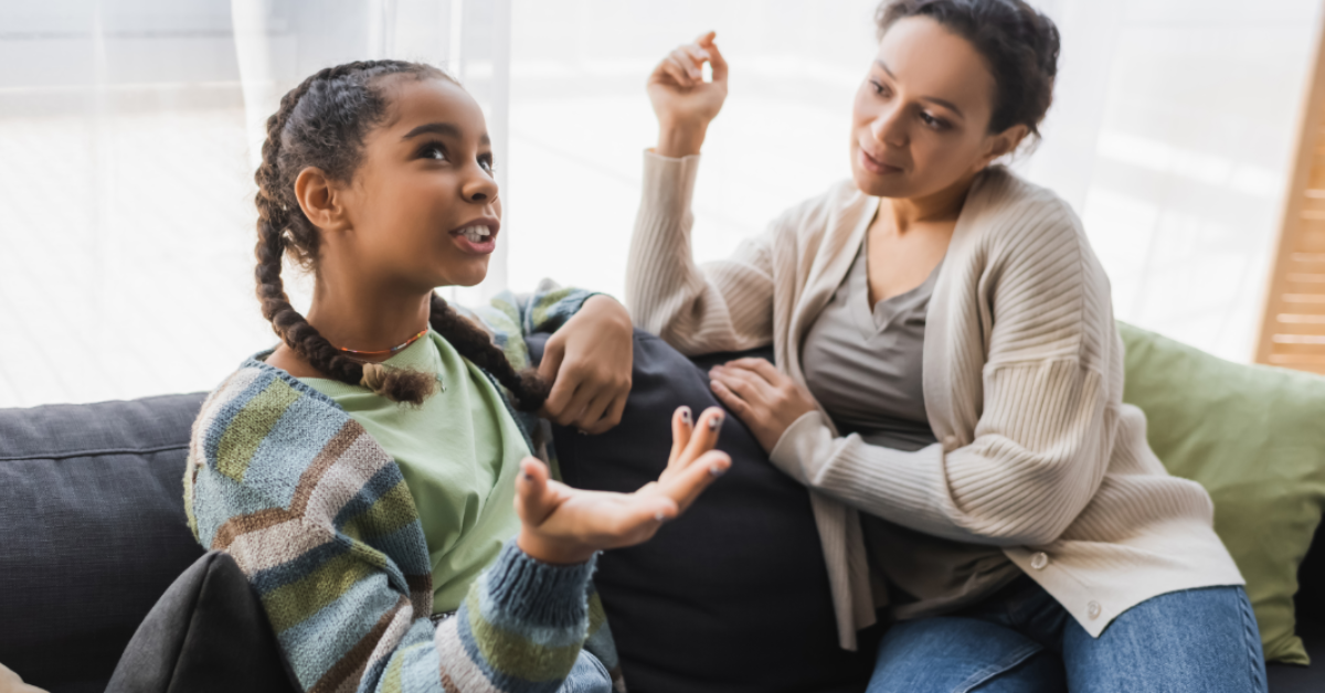 A teen talking to their mother.